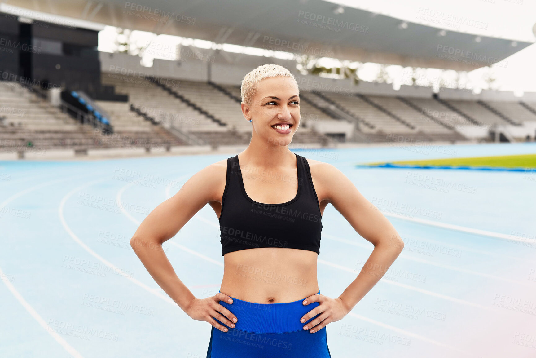 Buy stock photo Sports, confidence and woman runner in stadium ready for training, exercise and workout. Fitness, health and female athlete on track field preparing for running, marathon and race or competition