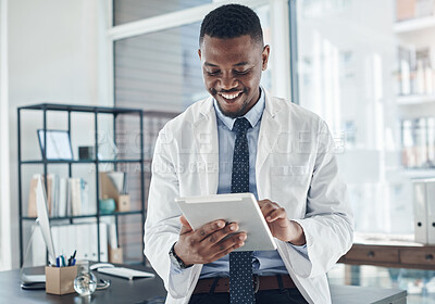 Buy stock photo Medical, doctor and tablet for work, smile and telehealth for clinic, serious and online for healthcare. Workplace, hospital and internet and technology for black man, science and research of staff