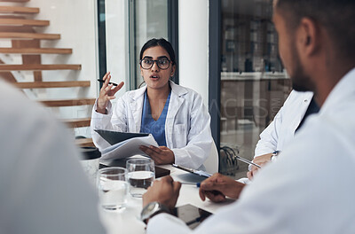 Buy stock photo Teamwork, medical people and woman talking in meeting for planning, treatment or opinion of diagnosis. Healthcare, collaboration and doctor with document for info, communication and idea for illness