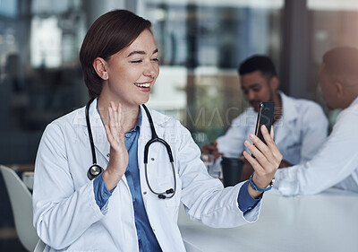 Buy stock photo Doctor, office and video call for consultation, communication or team meeting. Medical expert, hospital and smartphone for healthcare advice, telehealth service or virtual support with nurse for help