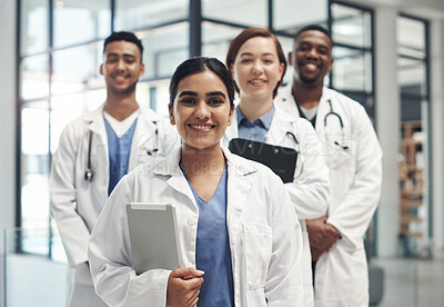 Buy stock photo Doctors, smile and portrait in hospital leader with clipboard for healthcare, wellness and solidarity. People, surgeons or physicians together for medical advice, teamwork and collaboration