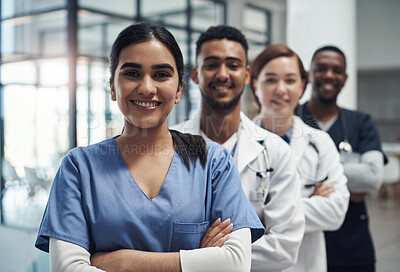 Buy stock photo Doctors, woman and arms crossed with smile, team or portrait for diversity in medical career at hospital. Surgeon group, people and men with collaboration, wellness and pride for healthcare services
