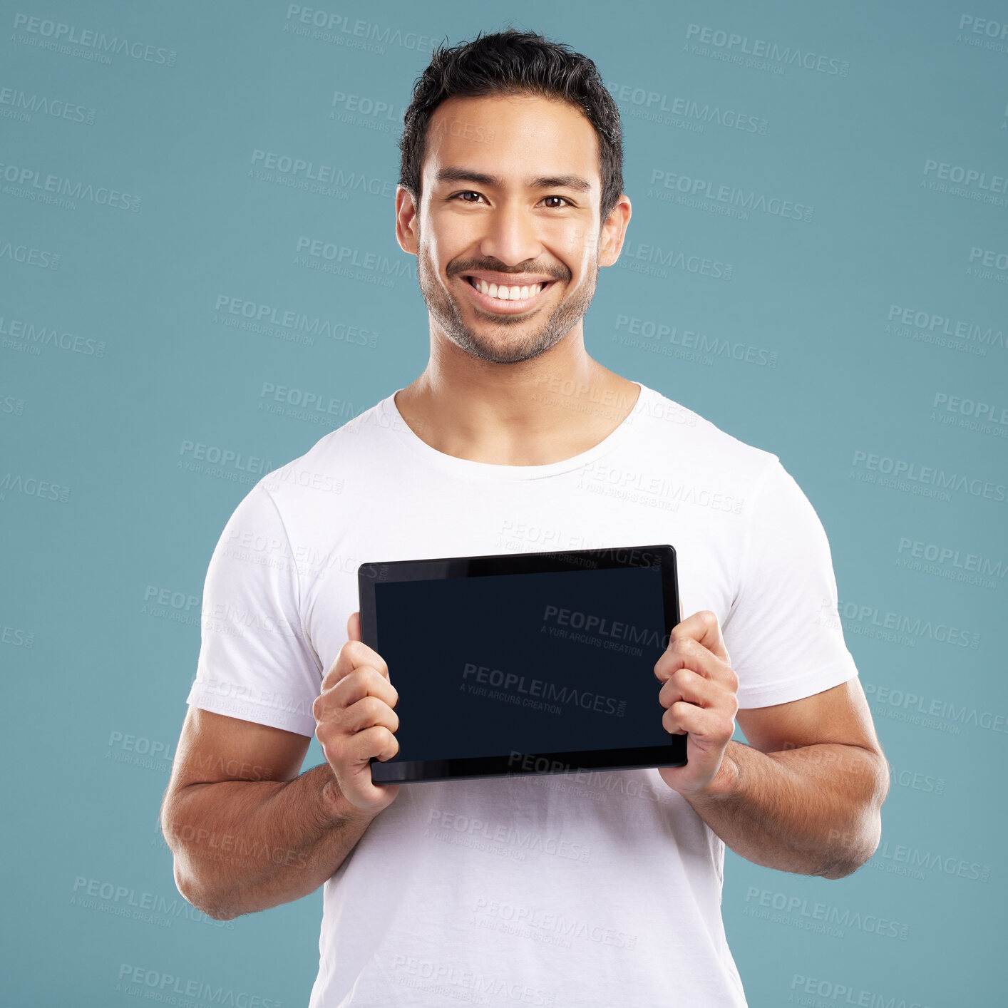 Buy stock photo Studio, man and portrait with tablet screen for advertising, app development and product marketing. Happiness, salesperson or web designer with technology for branding, promotion and blue background