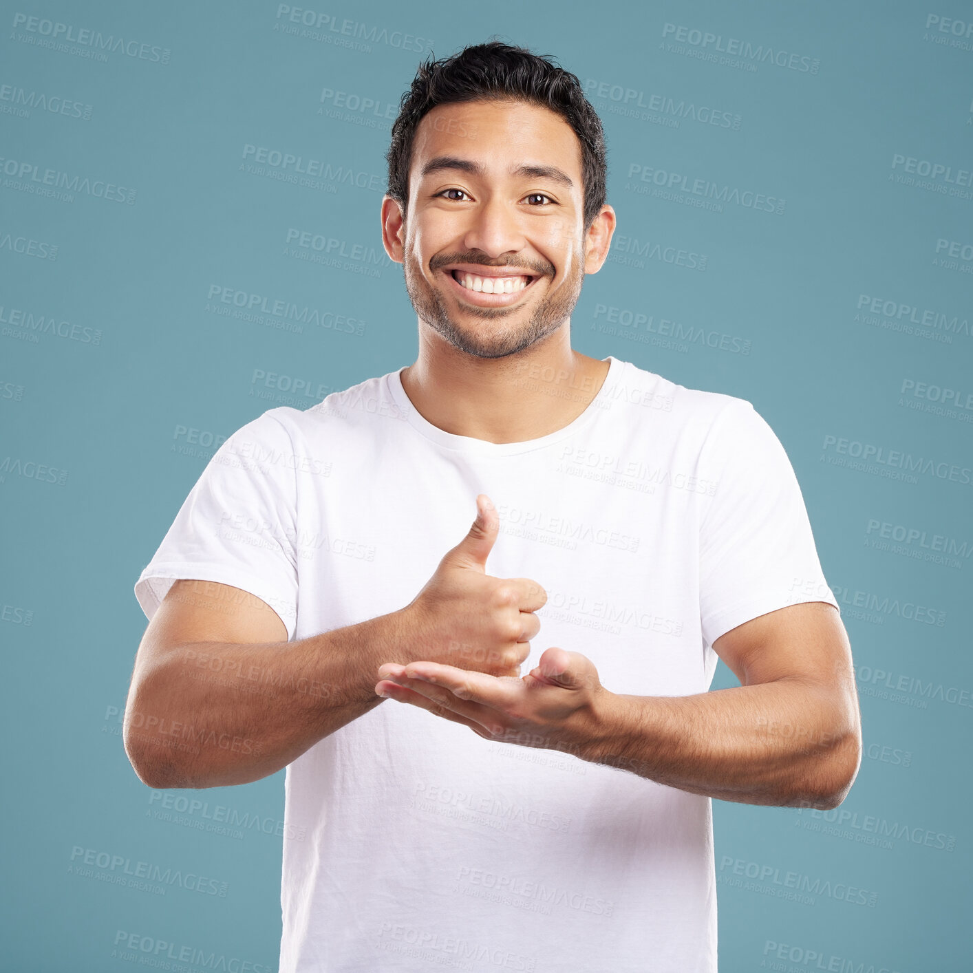 Buy stock photo Studio, happy man and portrait with thumbs up for support, feedback and satisfaction for agreement. Smile, male person and confidence with thank you gesture for motivation, vote and blue background