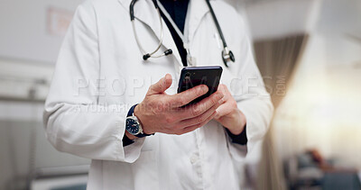 Buy stock photo Hands, doctor and man with smartphone, typing and healthcare with online schedule, internet and wellness. Closeup, medical and professional with cellphone, research for treatment and digital app