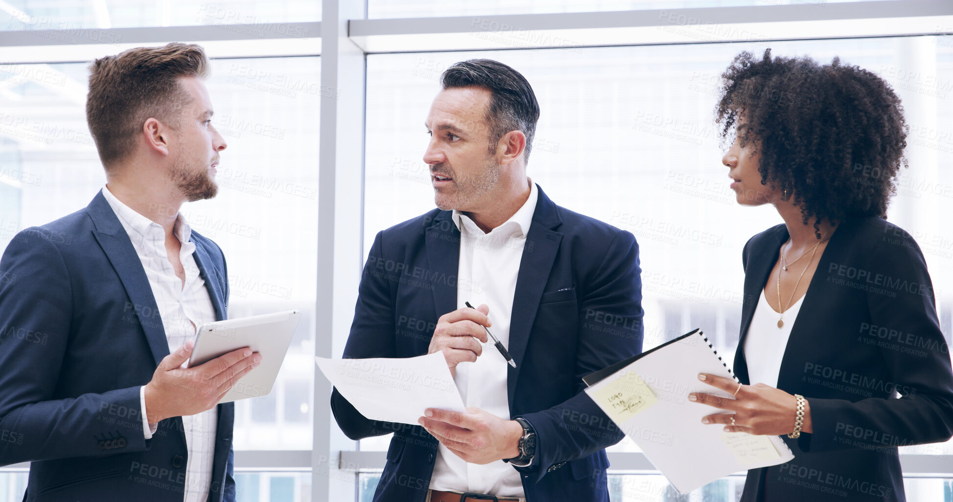 Buy stock photo Businessmen, tablet and people with meeting, feedback and manager for office and documents. Papers discussion, teamwork and talk with portfolio, growth strategy or project report for finance training