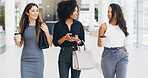 Business women, walking and team discussion in office for creative conversation, coffee and networking with phone. Happy workers, friends and together in lobby for collaboration or planning on break