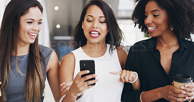 Buy stock photo Business women, phone and group discussion in office with social media, networking or show text. Happy workers, friends or mobile for collaboration, laugh or funny gossip in creative startup on break