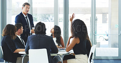Buy stock photo Education, meeting and question with business people in boardroom of office together for development. Coaching, feedback and hand raised with employee team in corporate workplace for training review
