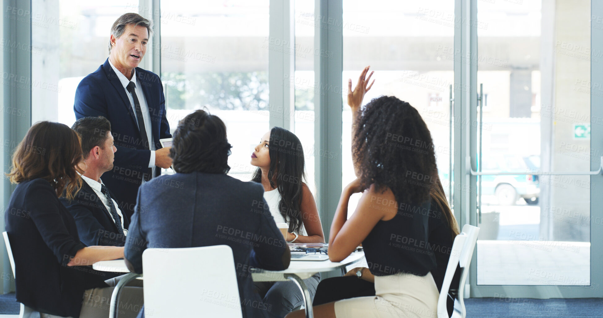 Buy stock photo Education, meeting and question with business people in boardroom of office together for development. Coaching, feedback and hand raised with employee team in corporate workplace for training review
