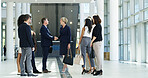CEO, business people and handshake in office for welcome, b2b introduction or greeting. Group, collaboration or shaking hands for agreement, deal or company merger with financial acquisition in lobby