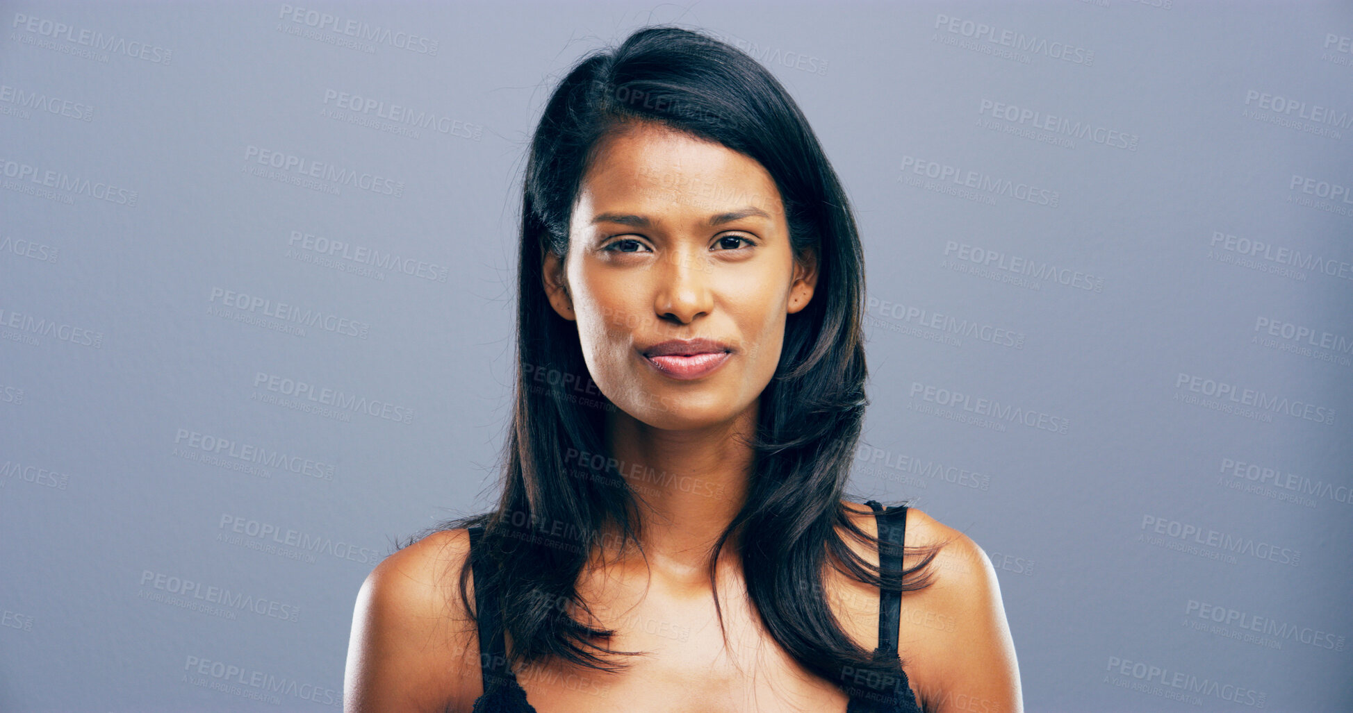 Buy stock photo Happy, smile and portrait of woman in studio for wellness, confidence and natural beauty. Mockup space, salon and isolated person with pride for cosmetics, hair care and texture on gray background