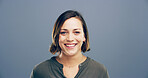 Happy woman, portrait and fashion with positive attitude for casual style or confidence on a gray studio background. Face, female person or model with smile for clothing or outfit on mockup space