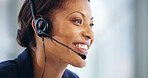 Office, businesswoman and smile with headset for customer service, telemarketing and support for sales. Call center, African female person and consultant with mic for feedback, listening and helping