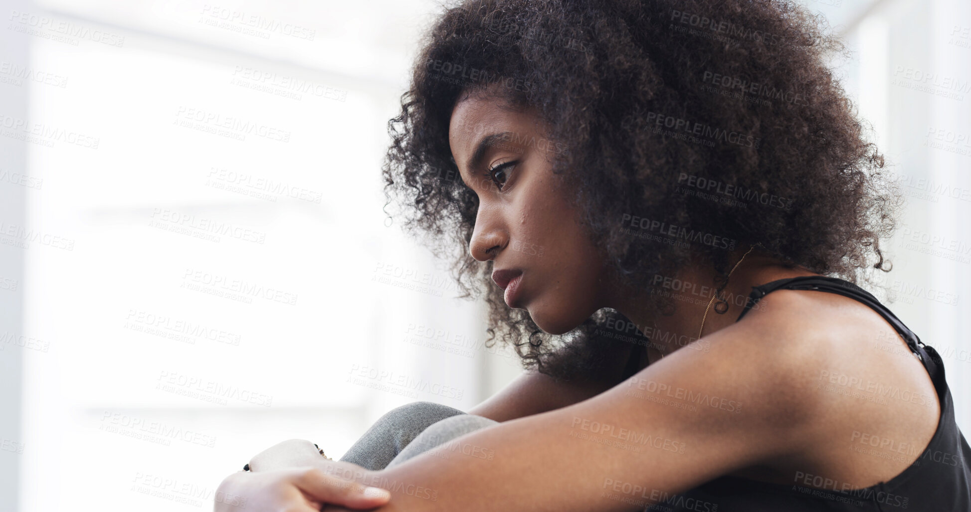 Buy stock photo Sad, woman and thinking with depression at house for loneliness, remember past and trauma challenges. African, person and anxiety from stress flashback, mourning loss and ptsd with grief of memory