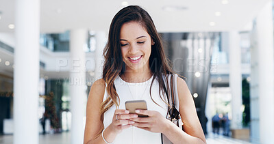 Buy stock photo Professional, woman and phone for reading with smile for notification, social media post or online communication. Female person, happy with mobile app for chat or check email in workplace lobby