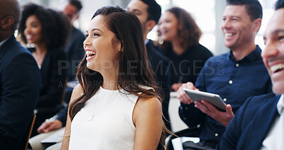 Buy stock photo Business, presentation and woman with laughing in audience for finance joke, ice breaker or training workshop. Conference, people or happy in office for group mentorship, funny feedback or work event