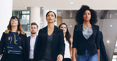 Buy stock photo Confidence, business people and team walking in office for solidarity, about us and low angle. Group, collaboration and corporate workforce together with determination, ambition or female leadership