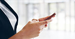 Hands, business and woman in office, smartphone and message to contact, social media and email. Person, closeup and accountant in workplace, cellphone and website info for economy news and connection