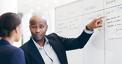 Buy stock photo Whiteboard, discussion or business people in meeting with task, schedule or project management. Pointing, list or team with timeline for brainstorming for progress, development or company resources