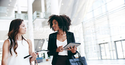 Buy stock photo Business women, smile and walking in lobby for opportunity, professional and career in news agency. Journalist, editor and tablet in office for company development, consultant or press for occupation