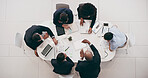 Above, meeting and tablet with business people in office for budget proposal, schedule and agreement. Project management, documents and technology with teamwork for paperwork, strategy or campaign