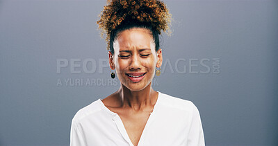 Buy stock photo Lonely, crying and woman with depression, studio and emotional for loss of relationship, divorce and grief. Mockup space, blue background and person with heartbreak for breakup, disappointed and sad