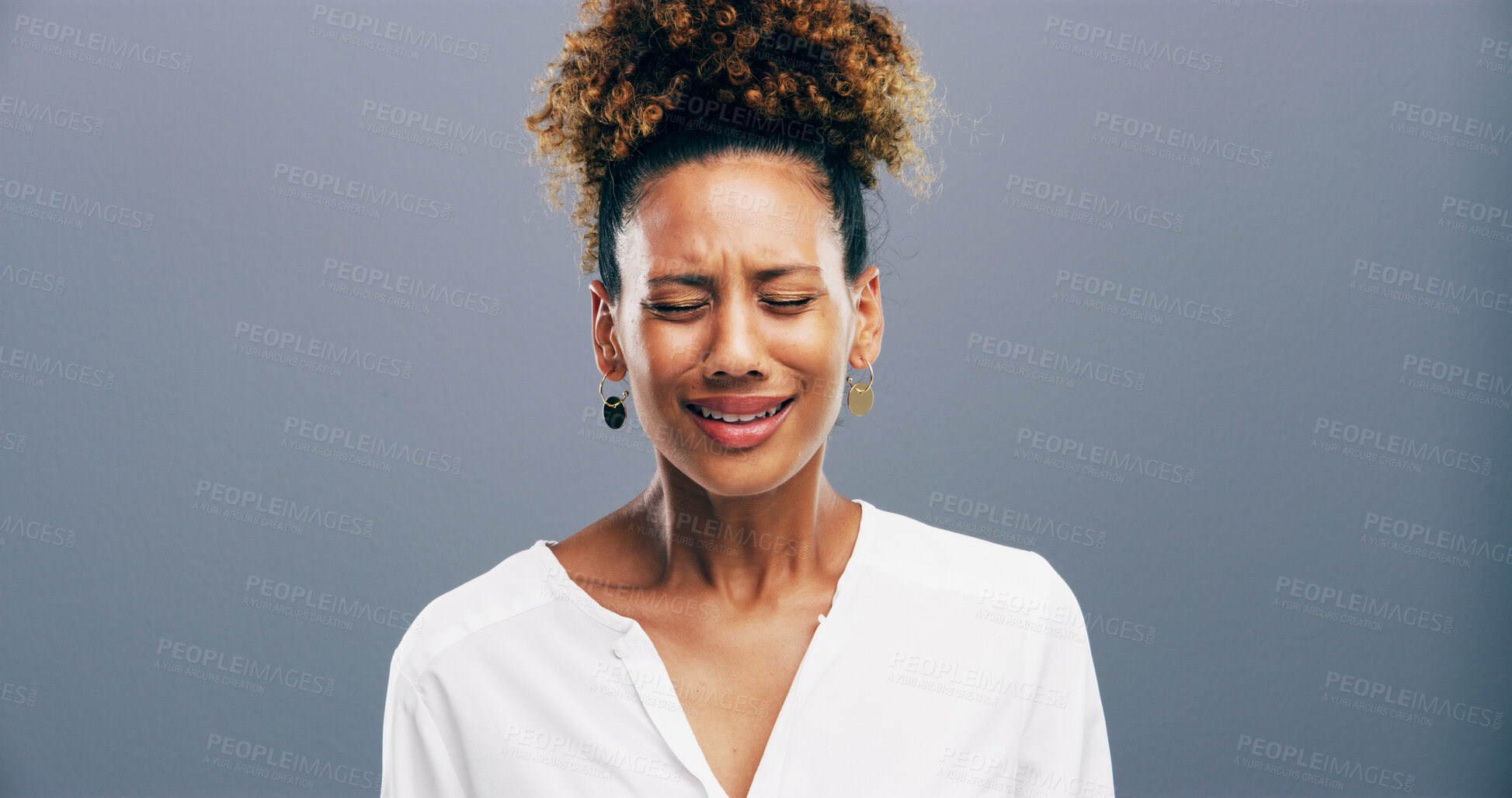 Buy stock photo Lonely, crying and woman with depression, studio and emotional for loss of relationship, divorce and grief. Mockup space, blue background and person with heartbreak for breakup, disappointed and sad