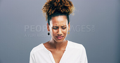 Buy stock photo Studio, crying and woman with depression, sad and emotional for loss of relationship, divorce and grief. Mockup space, blue background and person with heartbreak for breakup, disappointed and pain
