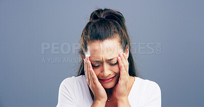 Buy stock photo Sad, crying and woman with heartbreak, studio and emotional for loss of relationship, divorce and grief. Mockup space, blue background and person with depression for breakup, disappointed and lonely