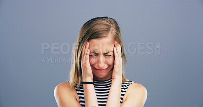 Buy stock photo Depression, woman and pain with crying in studio for mental health, grief and headache with mockup space. Emotion, girl and sad on gray background for mourning, broken heart and trauma from bad news