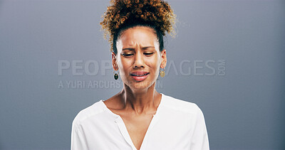 Buy stock photo Pain, crying and woman with depression, grief and emotional for loss of relationship, divorce and studio. Mockup space, blue background and person with heartbreak for breakup, disappointed and sad