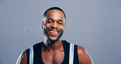 Buy stock photo Smile, active and black man with portrait in studio as fitness instructor, strong muscle and workout routine. Male person, mockup space and pride for gym opportunity, bodybuilding and gray background