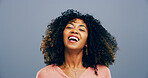 Studio, woman and portrait with laughing for comedy, funny memory and joke with mockup space. African model, female person and happiness with humor by blue background, satisfaction and emoji reaction