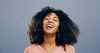 Buy stock photo Studio, woman and portrait with laughing for comedy, funny memory and joke with mockup space. African model, female person and happiness with humor by blue background, satisfaction and emoji reaction