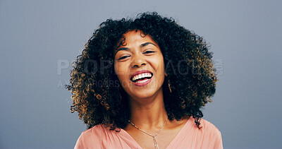 Buy stock photo Studio, woman and portrait with laughing for joke, funny memory or confident with comedy by space. African model, female person and happy with humor by blue background, satisfaction or emoji reaction