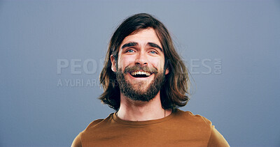 Buy stock photo Laughing, joke and portrait of man in studio for comic, funny and silly with mockup space. Happiness, meme and comedy with male person on blue background for smile, humor and giggle reaction
