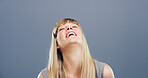 Laughing, funny and business with woman in studio for professional, designer and comedy. Happiness, creative startup and confidence with person on background for opportunity, entrepreneur and comic