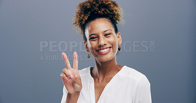 Buy stock photo Girl, peace sign and smile in studio, excited and icon with v symbol for victory by background. Woman, afro and happy with emoji, fashion and pride for portrait with hand gesture in Costa Rica