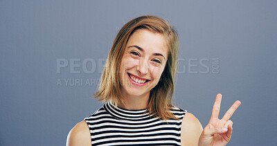 Buy stock photo Woman, peace sign and fashion in studio with smile, icon and v symbol for pride by background. Person, portrait and happy with emoji, style and vote for human rights with hand gesture in Germany