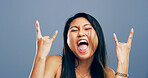 Rocker, hand and energy with portrait of asian woman in studio for metal music, punk identity and crazy. Devil horn sign, edgy and attitude with person on background for funky, emoji and expression