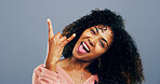 Rocker, hand and happy with portrait of woman in studio for metal music, punk identity and crazy. Devil horn sign, edgy and attitude with african person on background for energy, emoji and expression