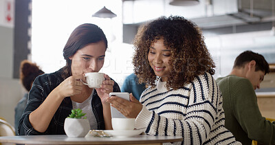 Buy stock photo Cafe, friends and women with smartphone, coffee and showing social media post on app, online and bonding. Conversation, smile and drinking tea on break, browsing and people with mobile in restaurant