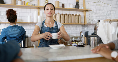 Buy stock photo Woman, waiter and serving coffee at cafe for customer service, espresso drink and order collection. Barista, client and giving beverage for breakfast catering, server helping and hospitality industry