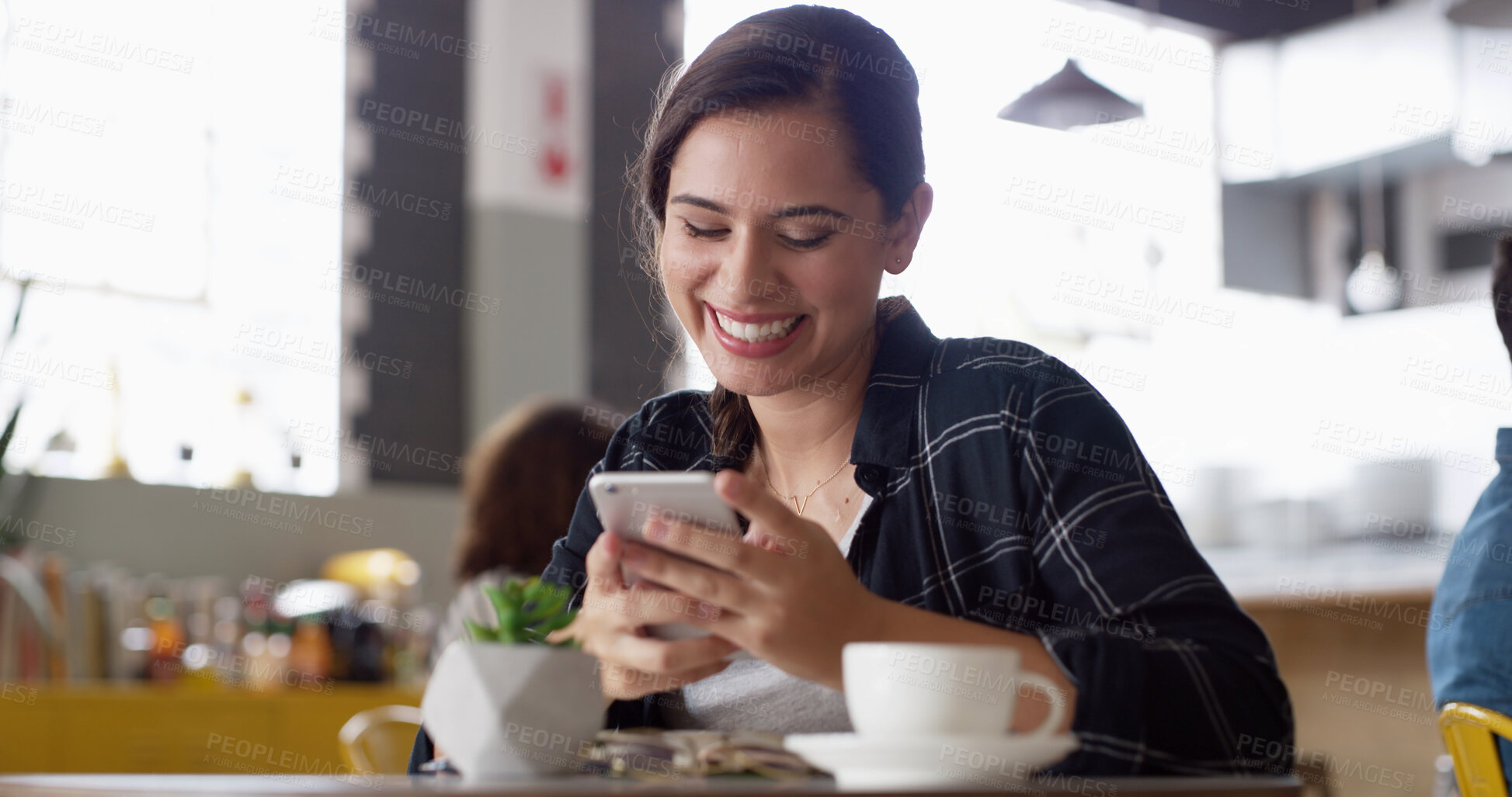 Buy stock photo Smile, internet and woman in cafe, smartphone and typing with social media, funny meme and relax. Person, mobile user and girl in restaurant, coffee and cellphone with digital app and connection
