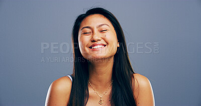 Buy stock photo Laughing, student and college with Asian woman in studio for gen z, education and scholarship. Future, happiness and university with female person on gray background for knowledge, academy and space