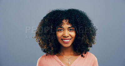 Buy stock photo African woman, portrait and hair care in studio with curly texture, natural growth and maintenance. Female person, afro hairstyle and treatment for hydration, grooming benefits and gray background