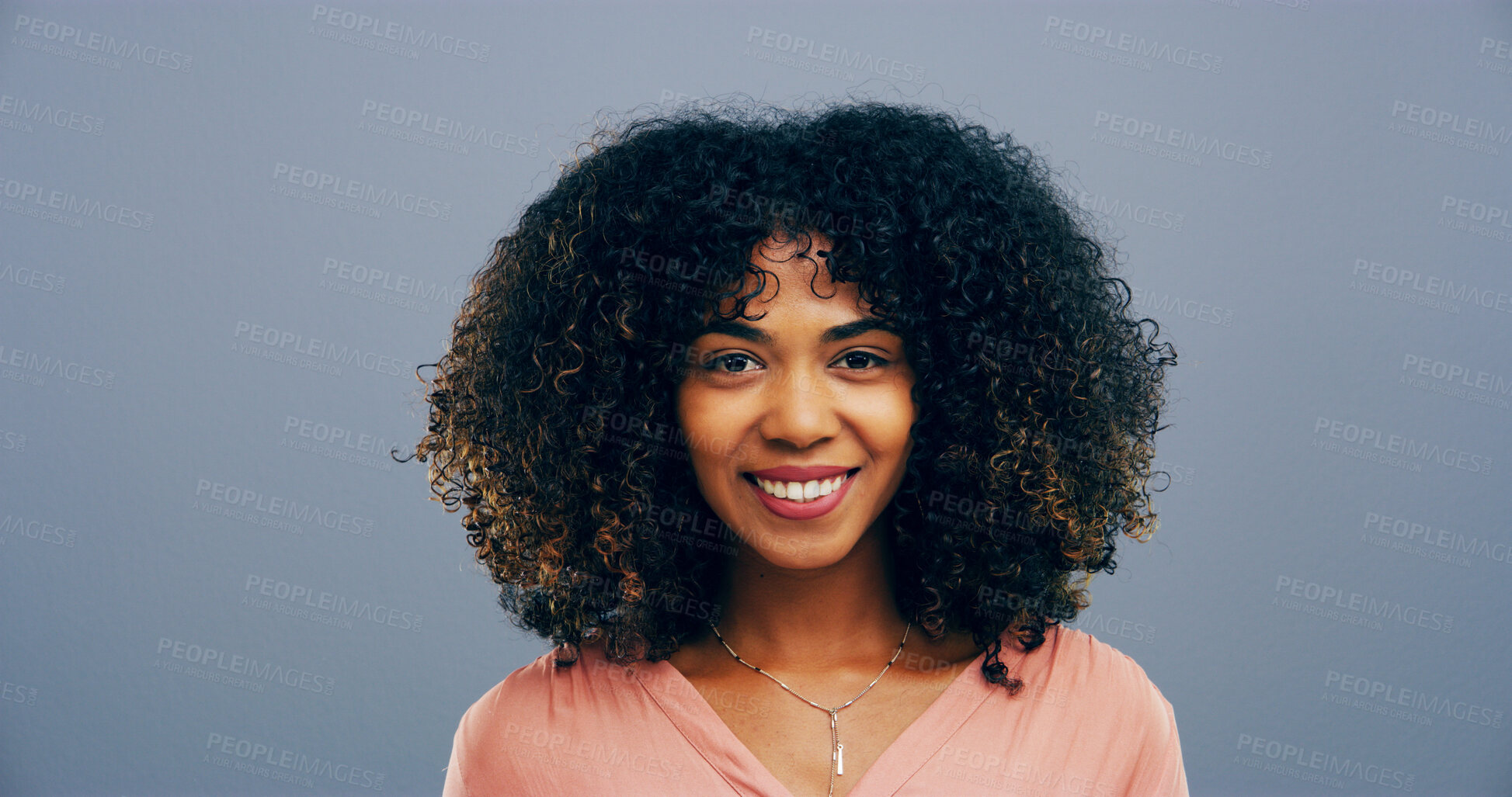 Buy stock photo African woman, portrait and hair care in studio with curly texture, natural growth and maintenance. Female person, afro hairstyle and treatment for hydration, grooming benefits and gray background