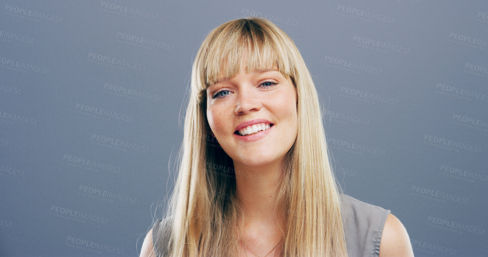 Buy stock photo Happy, pride and portrait of woman in studio with confidence for tutor career for education. Smile, gen z and female teacher at elementary school from Germany with knowledge by gray background.