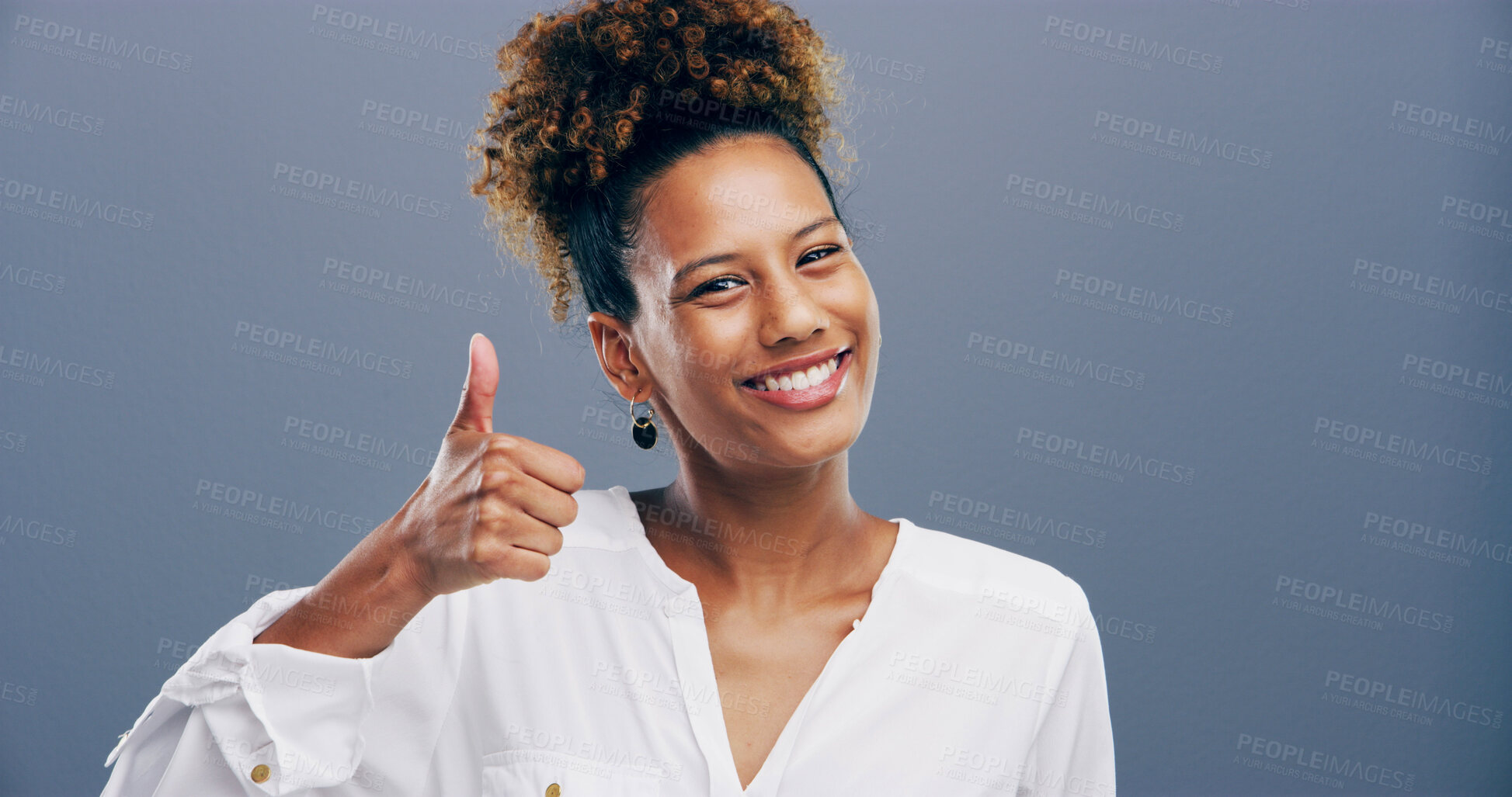 Buy stock photo Happy woman, portrait and thumbs up with feedback in studio for opinion or good job on a gray background. Female person, model or smile with like emoji or yes sign for positive approval or success